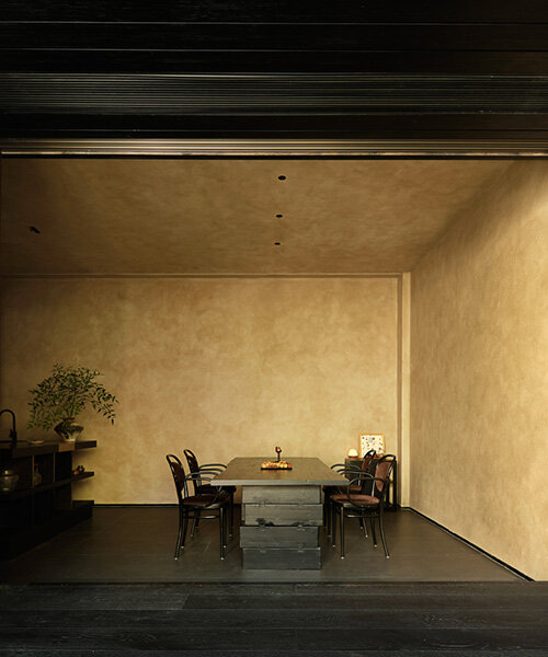 tea house by qicang design embraces seasonal rhythms behind sliding doors in china