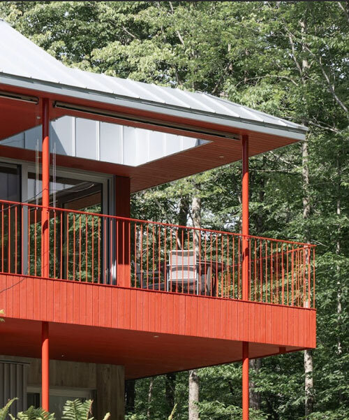 scarlet-red wood coats house by _naturehumaine floating above three streams in canada